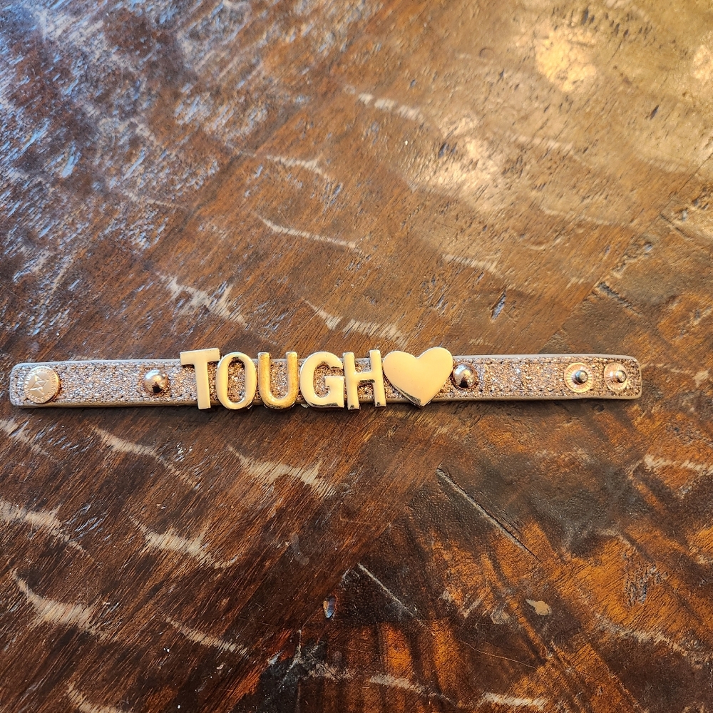 BCBGeneration Cuff Bracelet Adjustable Snap “TOUGH LOVE” Metallic Pink